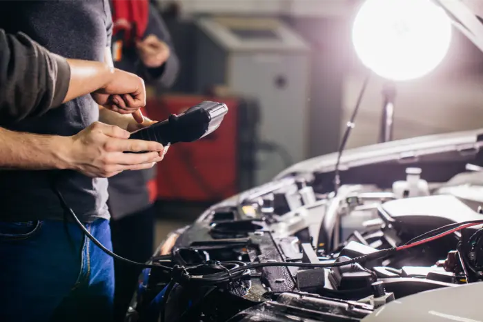 Diagnostic scan tool plugged into a car